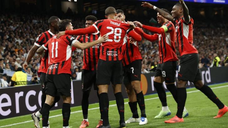 AC Milan celebrate during their 3-1 win at Real Madrid earlier this month.